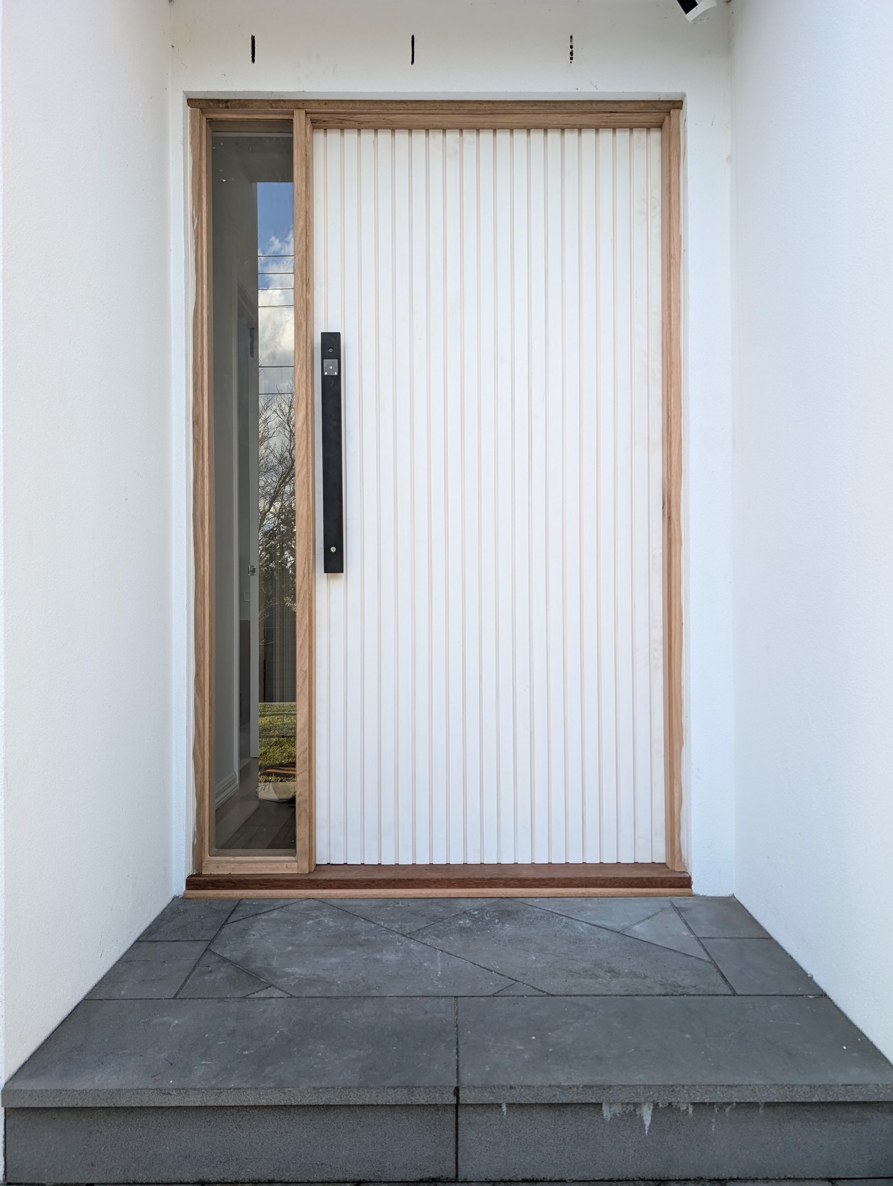 Pre-primed pine batten with sidelight — Black Rock