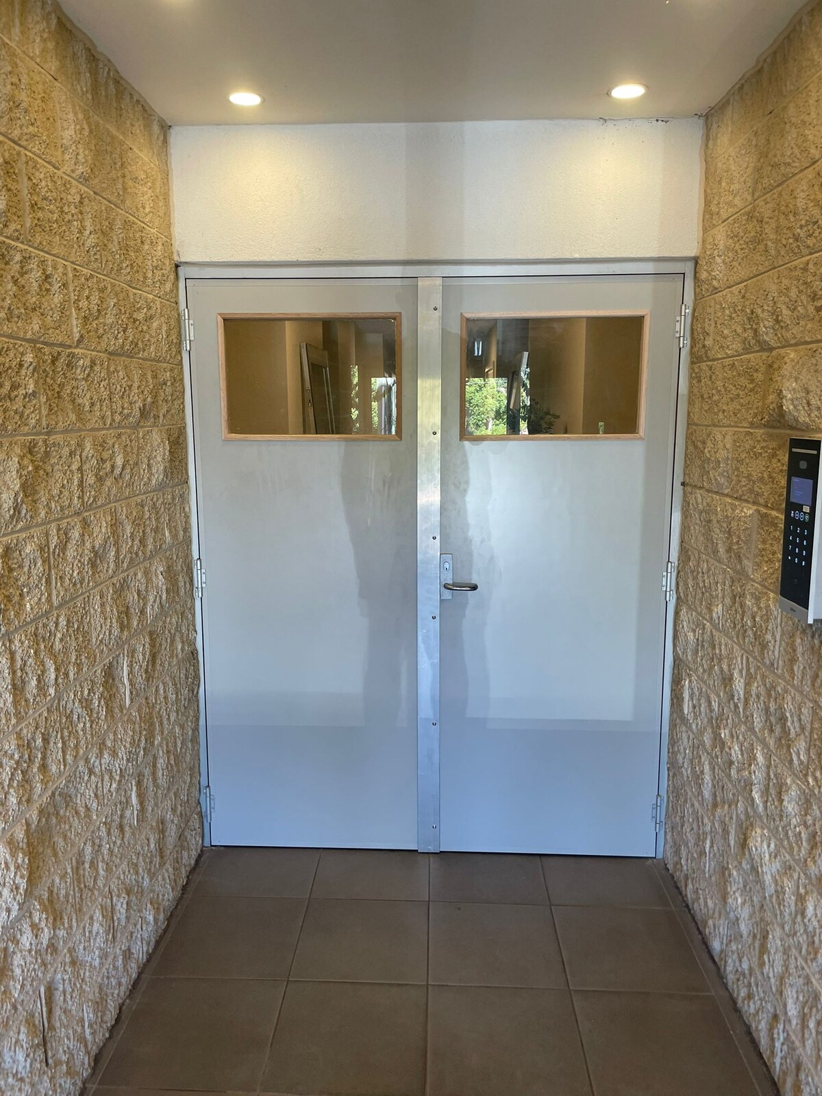 StormBloc Shale Grey half-lite external door with glazed vision panel