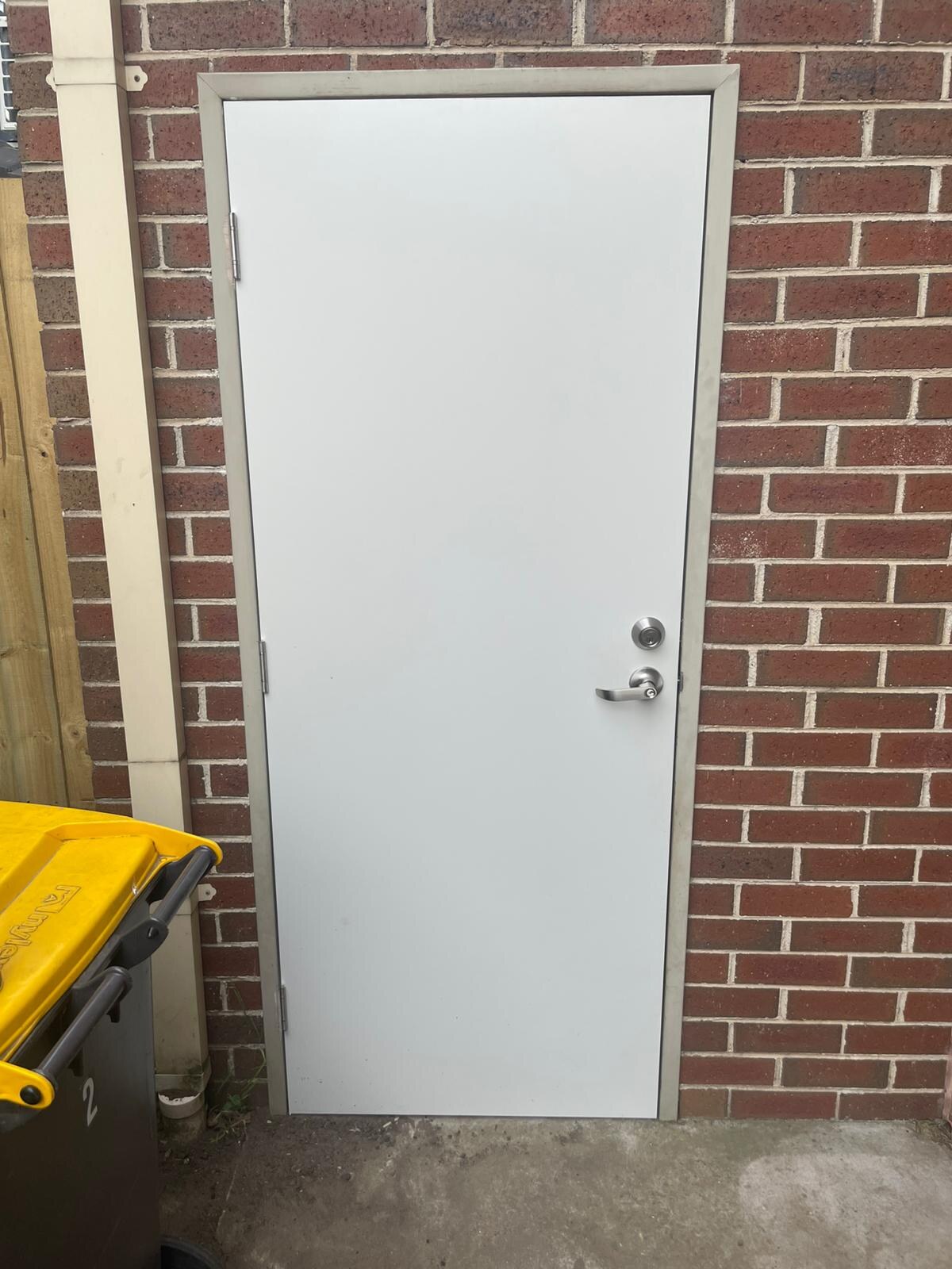 StormBloc Surf Mist external door installed at Clayton